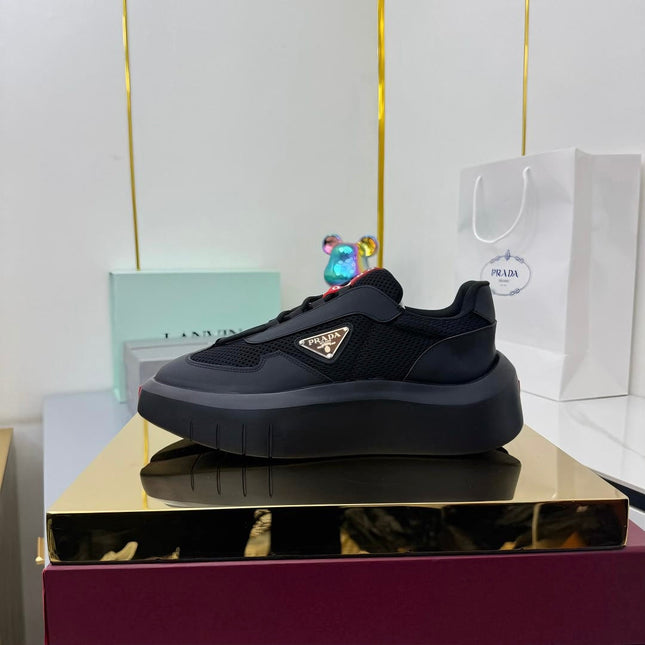 PRADA 25S CROSS LACED SNEAKERS IN BLACK CALFSKIN