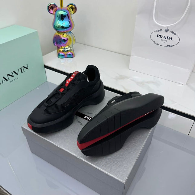 PRADA 25S CROSS LACED SNEAKERS IN BLACK CALFSKIN