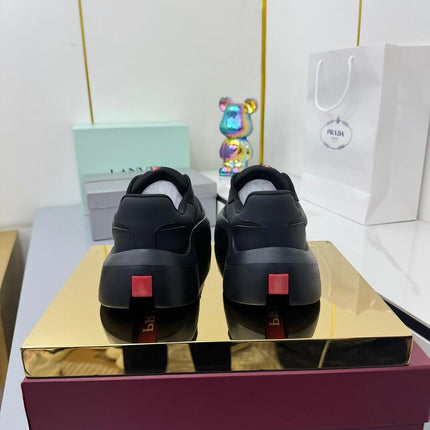 PRADA 25S SNEAKERS IN BLACK CALFSKIN