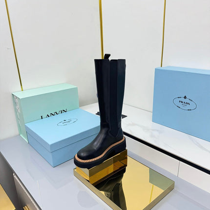 PRADA 25S TALL CHELSEA BOOTS 50MM IN BLACK CALFSKIN