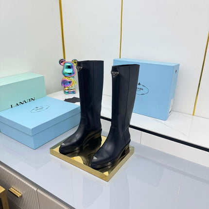 PRADA 25S POINTED TALL BOOTS 50MM IN BLACK CALFSKIN WITH LOGO