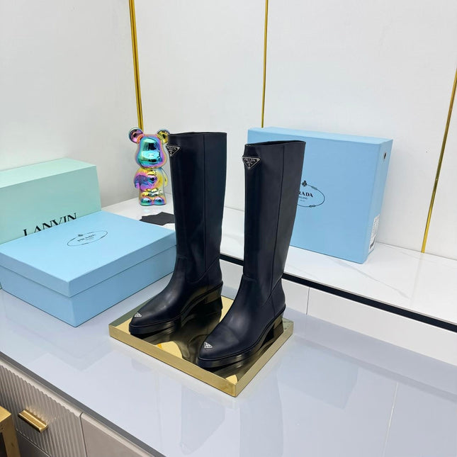 PRADA 25S POINTED TALL BOOTS 50MM IN BLACK CALFSKIN WITH LOGO