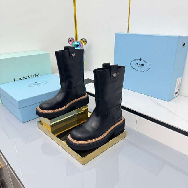 PRADA 25S HIGH MARTIN BOOTS 50MM IN BLACK CALFSKIN
