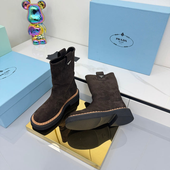 PRADA 25S HIGH MARTIN BOOTS 50MM IN DARK BROWN SUEDE