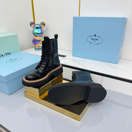 PRADA 25S LONG THICK SOLED MARTIN BOOTS 50MM IN BLACK GLOSSY CALFSKIN