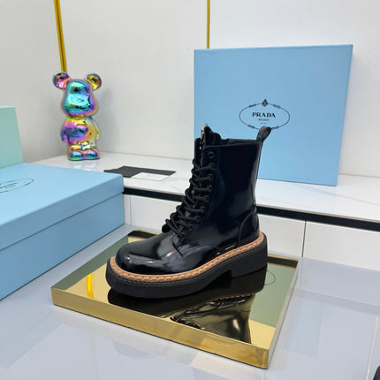 PRADA 25S LONG THICK SOLED MARTIN BOOTS 50MM IN BLACK GLOSSY CALFSKIN