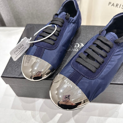 PRADA 25S COLLAPSE RE NYLON AND SUEDE SNEAKERS IN DARK BLUE WITH METAL TOECAP