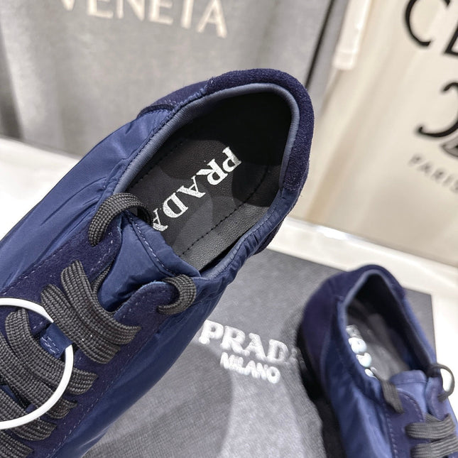 PRADA 25S COLLAPSE RE NYLON AND SUEDE SNEAKERS IN DARK BLUE WITH METAL TOECAP