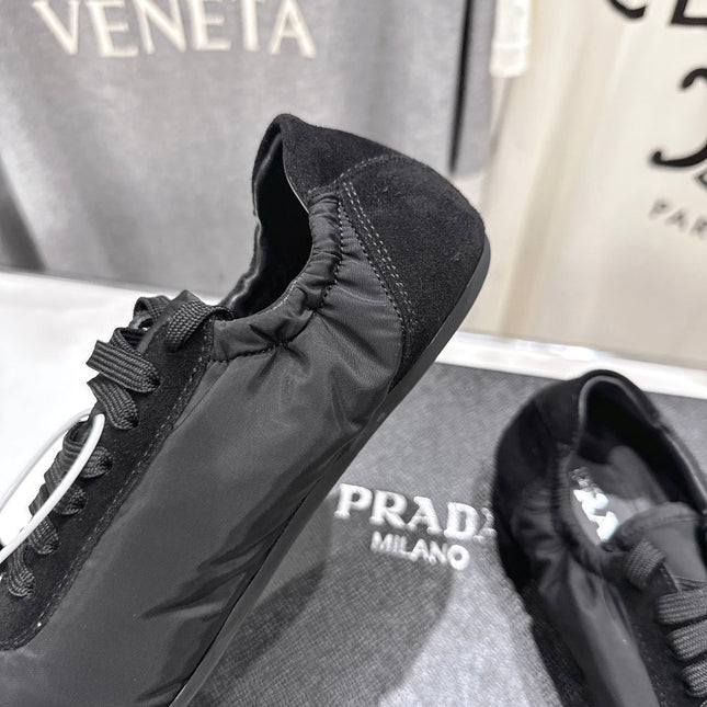 PRADA 25S COLLAPSE RE NYLON AND SUEDE SNEAKERS IN BLACK WITH METAL TOECAP