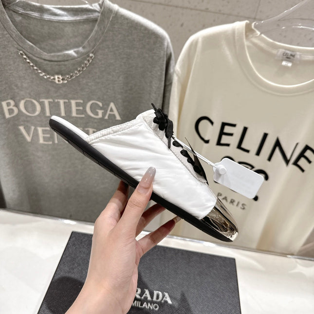 PRADA 25S MULES IN WHITE WITH METAL TOECAP