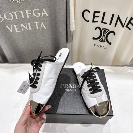 PRADA 25S MULES IN WHITE WITH METAL TOECAP