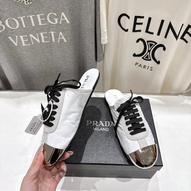 PRADA 25S MULES IN WHITE WITH METAL TOECAP