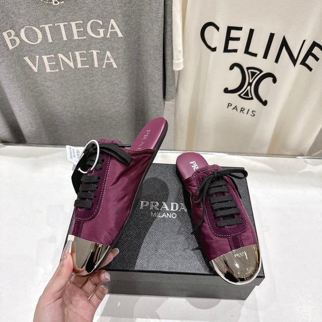 PRADA 25S MULES IN PLUM WITH METAL TOECAP