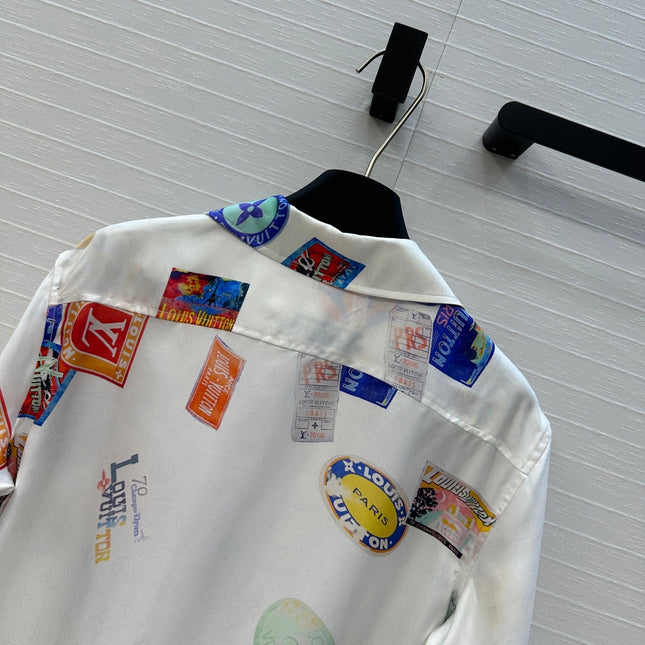 LV SHORT-SLEEVE PRINTED SILK BLOUSE 268226