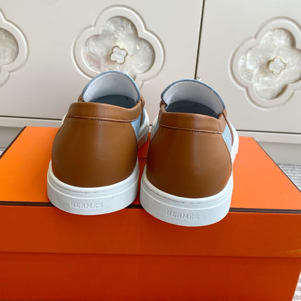 HM 25S SLIP-ON IN SKY BLUE CANVAS AND BROWN LAMBSKIN WITH SILVER HARDWARE