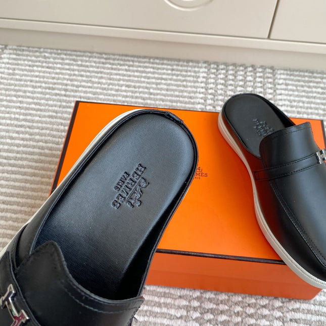 HM 25S MULES IN BLACK LAMBSKIN WITH SILVER HARDWARE