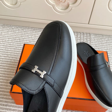 HM 25S MULES IN BLACK LAMBSKIN WITH SILVER HARDWARE