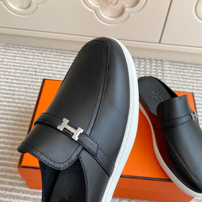 HM 25S MULES IN BLACK LAMBSKIN WITH SILVER HARDWARE