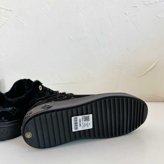 TIME OUT SNEAKER IN BLACK MONOGRAM EMBOSSED SUEDE WITH FLEECE LINING