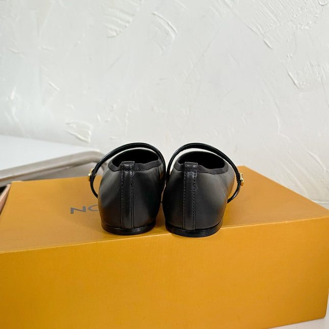 ROMY FLAT BALLERINA IN BLACK CALFSKIN