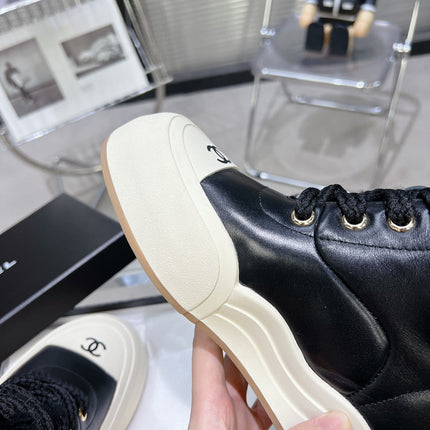 MARTIN BOOTS IN BLACK CALFSKIN AND LAMB FUR LINING