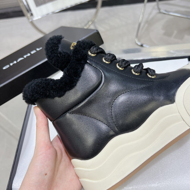 MARTIN BOOTS IN BLACK CALFSKIN AND LAMB FUR LINING