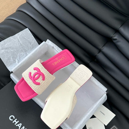 WOVEN SLIDE IN RAFFIA AND BRIGHT PINK LAMBSKIN