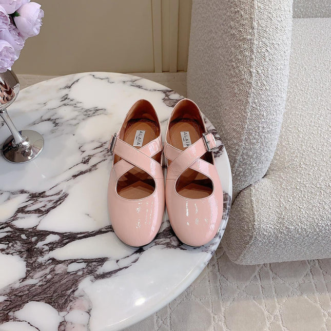 ALAIA CRISS CROSS BALLET FLAT IN BABY PINK LAMBSKIN WITH SILVER HARDWARE