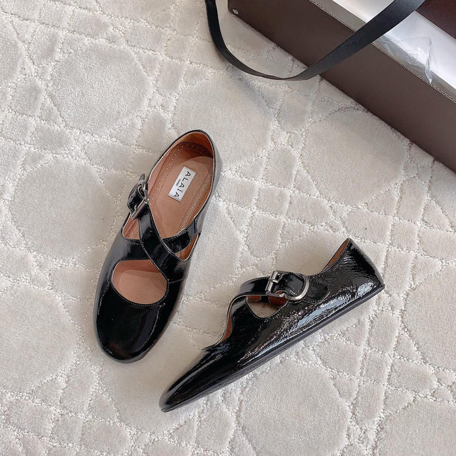 ALAIA CRISS CROSS BALLET FLAT IN BLACK LAMBSKIN WITH SILVER HARDWARE