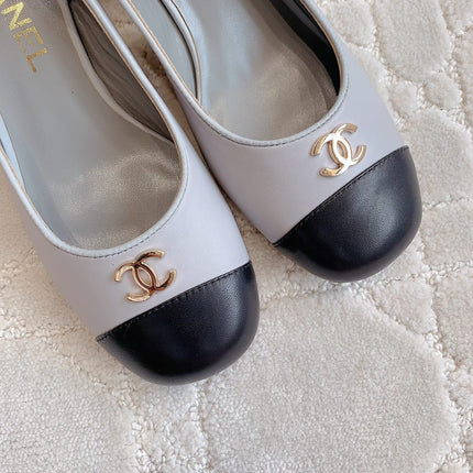 SLINGBACKS IN SLATE GREY MIX BLACK SHEEPSKIN