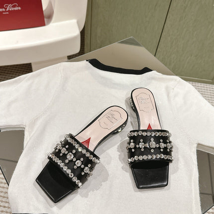 TRUMPET METALLIC MULES IN BLACK PATENT CALFSKIN WITH EMBELLISHED BUCKLE