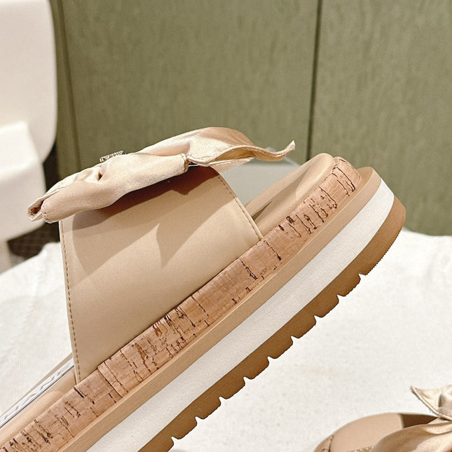 CC SLIPPERS WITH SILK BOW IN BEIGE ALMOND COWHIDE