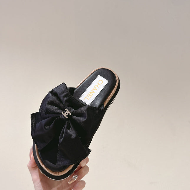 CC SLIPPERS WITH SILK BOW IN BLACK COWHIDE