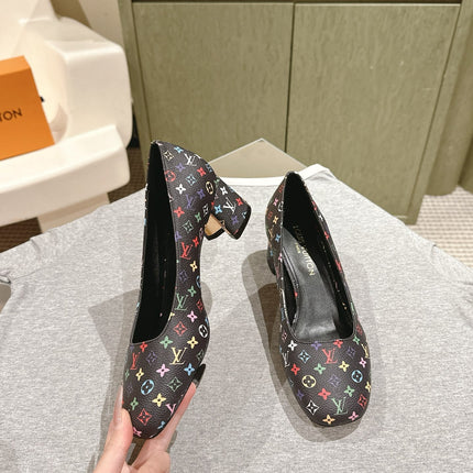 SWING HIGH PUMP 55 MM IN BLACK MONOGRAM CALFSKIN