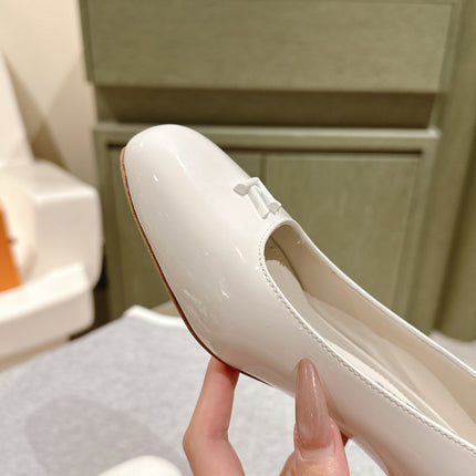 SWING HIGH PUMP 55 MM IN WHITE PATENT CALFSKIN