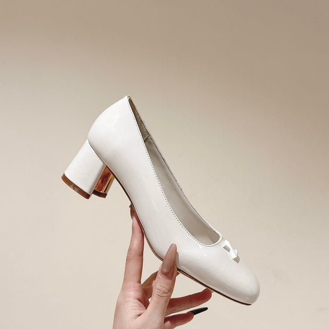 SWING HIGH PUMP 55 MM IN WHITE PATENT CALFSKIN