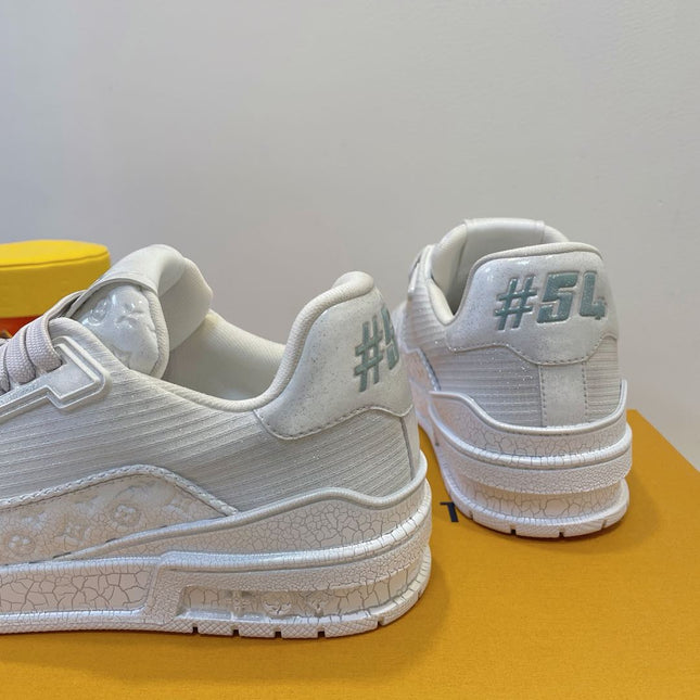 LV TRAINER MAXI SNEAKER IN WHITE EMBOSSED CALFSKIN