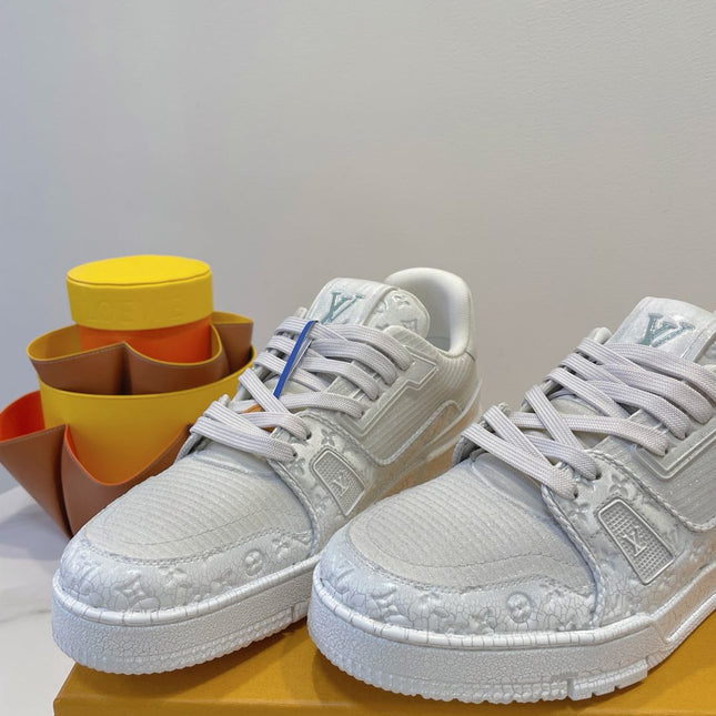 LV TRAINER MAXI SNEAKER IN WHITE EMBOSSED CALFSKIN