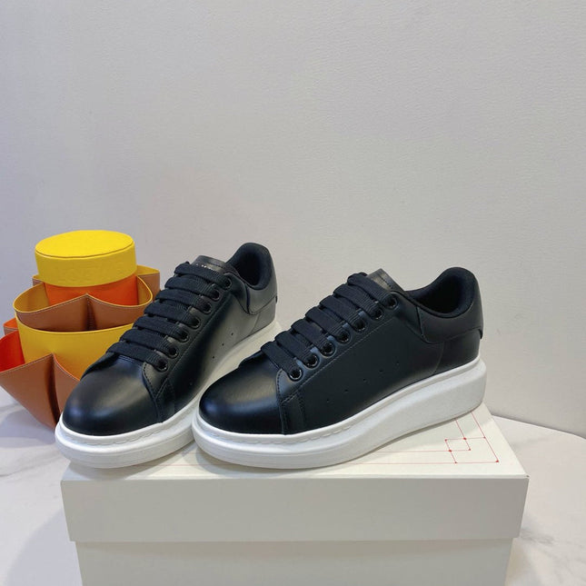 OVERSIZED SNEAKERS IN BLACK SMOOTH CALFSKIN WITH BLACK HEEL DETAIL
