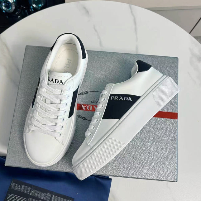 PRADA 25S LEATHER LOGO OUTLET SNEAKERS BLACK AND WHITE CALFSKIN