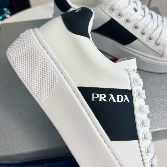 PRADA 25S LEATHER LOGO OUTLET SNEAKERS BLACK AND WHITE CALFSKIN