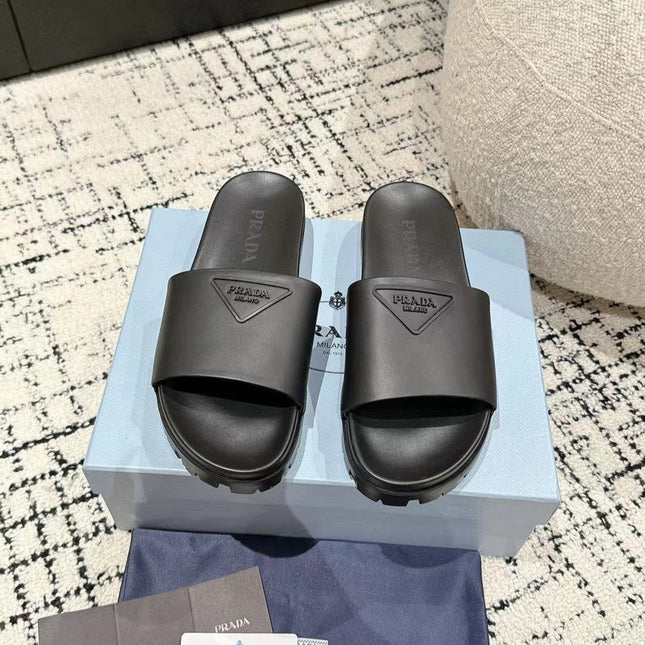 PRADA 25S RUBBER SLIDE IN CHARCOAL CALFSKIN WITH LOGO
