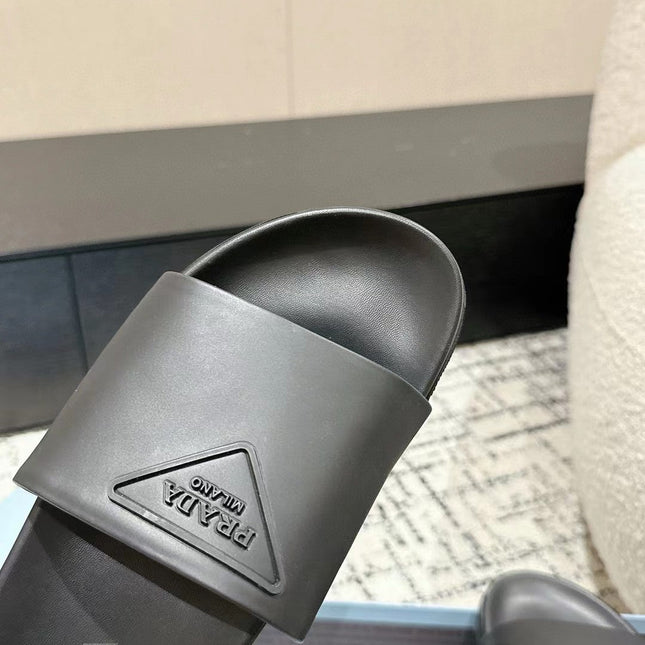 PRADA 25S RUBBER SLIDE IN CHARCOAL CALFSKIN WITH LOGO