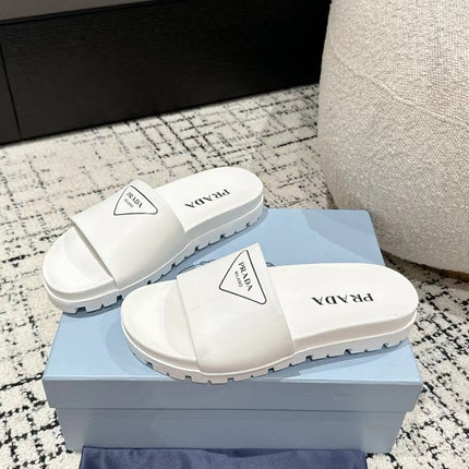 PRADA 25S RUBBER SLIDE IN WHITE CALFSKIN WITH LOGO