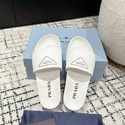 PRADA 25S RUBBER SLIDE IN WHITE CALFSKIN WITH LOGO