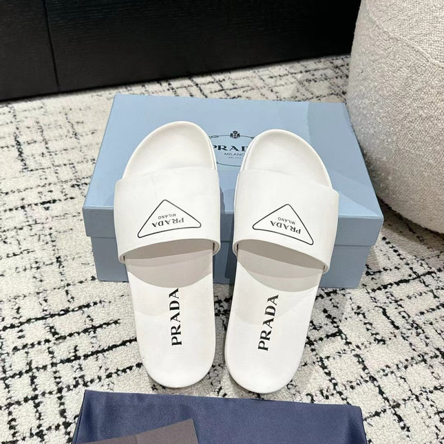 PRADA 25S RUBBER SLIDE IN WHITE CALFSKIN WITH LOGO