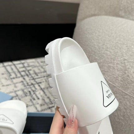PRADA 25S RUBBER SLIDE IN WHITE CALFSKIN WITH LOGO