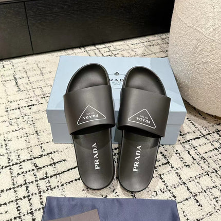 PRADA 25S RUBBER SLIDE IN BLACK CALFSKIN WITH LOGO