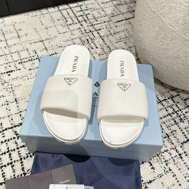 PRADA 25S PADDED SLIDES IN WHITE CALFSKIN WITH LOGO