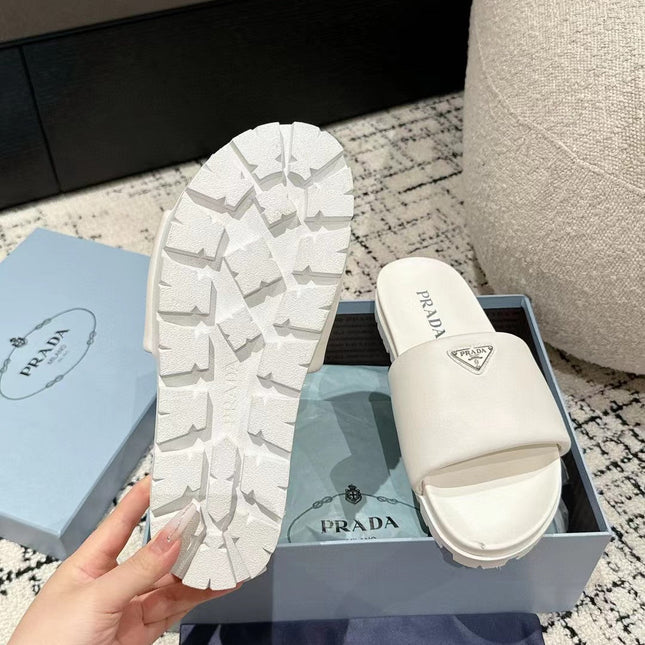 PRADA 25S PADDED SLIDES IN WHITE CALFSKIN WITH LOGO